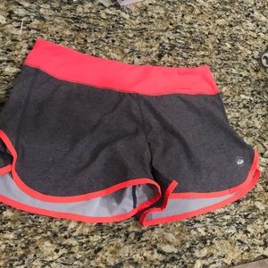 Senita running shorts size medium pink and grey
